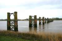 Piers of the former Alloa swing bridge stand in the Forth in April 2006 - view south towards Throsk.<br><br>[John Furnevel 27/04/2006]