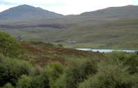 A Sprinter heading past Loch a Chuilinn heading for Lochluichart.<br><br>[Ewan Crawford //]