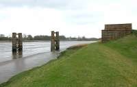 Abutment and two of the piers of the former Alloa swing bridge on the north shore of the Forth in April 2006 - looking west along the river towards Stirling.<br><br>[John Furnevel 27/04/2006]