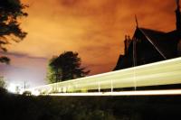 Inverness-Aberdeen train passing the closed station at Llanbryde.<br><br>[Ewan Crawford //]