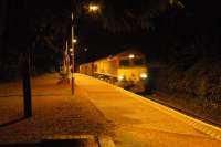 Mossend-Crianlarich freight passes through Helensburgh Upper.<br><br>[Ewan Crawford //]