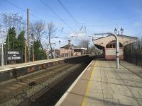 <h4><a href='/locations/H/Hanwell'>Hanwell</a></h4><p><small><a href='/companies/G/Great_Western_Railway'>Great Western Railway</a></small></p><p>Hanwell, looking east towards Paddington, on 9th February 2019. The main up and down fast lines are to the right of the fence, blocking off access to the other side of the central island platform. The down platform on the fast lines was removed many years ago. The sign on the up platform shows 'Hanwell and Elthorne', the name of the station from 1896 to 1974. 47/189</p><p>09/02/2019<br><small><a href='/contributors/David_Bosher'>David Bosher</a></small></p>