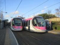 <h4><a href='/locations/B/Black_Lake_Tram'>Black Lake [Tram]</a></h4><p><small><a href='/companies/B/Birmingham,_Wolverhampton_and_Dudley_Railway_Great_Western_Railway'>Birmingham, Wolverhampton and Dudley Railway (Great Western Railway)</a></small></p><p>Midland Metro (since renamed West Midlands Metro) trams nos. 31 to Wolverhampton St. George's (left) and 23 to Bull Street, Birmingham at Black Lake stop, on 30th January 2016.   This is on the alignment of the former GWR main line between Birmingham Snow Hill and Wolverhampton Low Level, which saw through express trains between London Paddington and Birkenhead Woodside until 1967 with the latter station closing at the same time, but there was never a station at Black Lake prior to the line's closure in 1972. 12/16</p><p>30/01/2016<br><small><a href='/contributors/David_Bosher'>David Bosher</a></small></p>