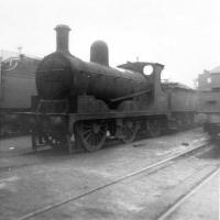 Former Aspinall design Lancashire & Yorkshire Railway Class 27 3F 0-6-0 52355 rests on 56A Wakefield shed on 19 March 1961.