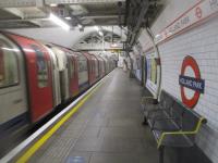 <h4><a href='/locations/H/Holland_Park'>Holland Park</a></h4><p><small><a href='/companies/C/Central_London_Railway'>Central London Railway</a></small></p><p>LUL 1992 stock on an eastbound Central Line short working to Loughton arriving at Holland Park on 29th May 2021. This station serves the park of that name, and the rather affluent west London neighbourhood of the same name, and opened in 1900 with the first stage of the Central London Railway from Shepherds Bush to Bank. 29/30</p><p>29/05/2021<br><small><a href='/contributors/David_Bosher'>David Bosher</a></small></p>