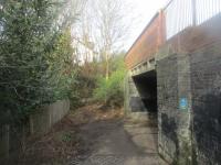<h4><a href='/locations/C/Cranley_Gardens'>Cranley Gardens</a></h4><p><small><a href='/companies/M/Muswell_Hill_Railway'>Muswell Hill Railway</a></small></p><p>Ramp down to the Parkland Walk, the former GNR Alexandra Palace branch at Cranley Gardens, that was constructed in the 1970s when the trackbed to Muswell Hill became one of two separate sections of the Parkland Walk footpath (the other runs along the trackbed from just east of Highgate to just north of Finsbury Park.)   The line opened in 1873 and closed to passengers in 1954 after almost becoming part of the LUL Northern Line; the site of Cranley Gardens station, added to the line in 1902 and now occupied by flats, is on the left behind the fence. 19/33</p><p>12/02/2019<br><small><a href='/contributors/David_Bosher'>David Bosher</a></small></p>