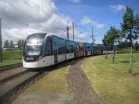 <h4><a href='/locations/I/Ingliston_Park_and_Ride_Tram'>Ingliston Park and Ride [Tram]</a></h4><p><small><a href='/companies/E/Edinburgh_Trams'>Edinburgh Trams</a></small></p><p>Edinburgh Trams no. 254 from Airport to St. Andrew Square rounding the curve on the approach to its first stop at Ingliston Park & Ride, at 11.04 on Saturday, 18th June 2022. 6/8</p><p>18/06/2022<br><small><a href='/contributors/David_Bosher'>David Bosher</a></small></p>
