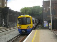 <h4><a href='/locations/S/South_Hampstead'>South Hampstead</a></h4><p><small><a href='/companies/N/New_Lines_London_and_North_Western_Railway'>New Lines (London and North Western Railway)</a></small></p><p>378233, with a London Overground Euston to Watford Junction service, emerging from tunnel and arriving at its first stop at South Hampstead on 15th June 2013. This station opened in 1879 as Loudoun Road for Swiss Cottage and was renamed in 1922. The disused platforms on the WCML are out of view on the right (see image <a href='/img/67/931/index.html'>67931</a>).  Just above the tunnel portals in the background runs the Chiltern Line to and from Marylebone without a station here, so no interchange facilities. 20/58</p><p>15/06/2013<br><small><a href='/contributors/David_Bosher'>David Bosher</a></small></p>