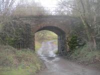 <h4><a href='/locations/A/Aberfeldy'>Aberfeldy</a></h4><p><small><a href='/companies/A/Aberfeldy_Branch_Inverness_and_Perth_Junction_Railway'>Aberfeldy Branch (Inverness and Perth Junction Railway)</a></small></p><p>Bridge carrying old Highland Railway branch line from Ballinluig to Aberfeldy, which closed in 1965, seen just to the east of the site of the branch terminus, on 12th March 2019. The junction station at Ballinluig, on the Highland Railway main line from Perth to Inverness, also closed at the same time. 26/40</p><p>12/03/2019<br><small><a href='/contributors/David_Bosher'>David Bosher</a></small></p>