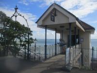 <h4><a href='/locations/S/Southend-on-Sea_Upper'>Southend-on-Sea [Upper]</a></h4><p><small><a href='/companies/S/Southend_Cliff_Railway'>Southend Cliff Railway</a></small></p><p>Exterior of the attractive upper station of the Southend Cliff Railway, Essex, opposite Clifton Terrace, on the afternoon of Bank Holiday Monday, 29th August 2022. This funicular runs on the site of a pioneering moving walkway, a forerunner of today's escalators, constructed in 1901 by an American engineer named Jesse W. Reno. This soon proved noisy and unreliable and the current lift was constructed in 1912 by Waygood & Company which, two years later, became part of the Otis Elevator Company. It was modernised in 1930, 1959 and 1990 with the car being replaced each time. It closed in 2003 for a major refurbishment but new EU regulations, that designated the lift as a cable car, required modifications and it was not until 25th May 2010 that it finally reopened, the restoration costing three million pounds with 650k spent on the car alone. 3/4</p><p>29/08/2022<br><small><a href='/contributors/David_Bosher'>David Bosher</a></small></p>