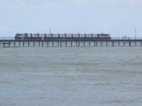 <h4><a href='/locations/S/Southend_Pier_Shore'>Southend Pier [Shore]</a></h4><p><small><a href='/companies/S/Southend_Pier_Railway'>Southend Pier Railway</a></small></p><p>One of the old 1986 Severn Lamb trains, 'Sir William Heygate', on the Southend Pier Railway heading across the Thames Estuary from Pier Head to Shore (right to left) on the world's longest pier, on Bank Holiday Monday, 29th August 2022. Despite brand new trains having been delivered a few months earlier, none were in service on this day which was a great disappointment. 8/12</p><p>29/08/2022<br><small><a href='/contributors/David_Bosher'>David Bosher</a></small></p>