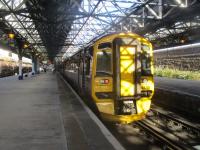 <h4><a href='/locations/D/Dundee'>Dundee</a></h4><p><small><a href='/companies/T/Tay_Bridge_and_Associated_Lines_North_British_Railway'>Tay Bridge and Associated Lines (North British Railway)</a></small></p><p>158726, in sunlight and shadow, waiting to depart from a Dundee bay platform with an evening service to Edinburgh Waverley, via the Tay Bridge, on 26th September 2018. 24/43</p><p>26/09/2018<br><small><a href='/contributors/David_Bosher'>David Bosher</a></small></p>