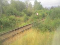 <h4><a href='/locations/C/Crianlarich'>Crianlarich</a></h4><p><small><a href='/companies/W/West_Highland_Railway'>West Highland Railway</a></small></p><p>Just to the north of Crianlarich, the 1897 spur to the surviving western section of the Callander & Oban line diverges and descends. It was not regularly used by passenger trains until 1965 when the eastern section of the C & O through Killin Junction was closed. This view is from the Mallaig portion of the ex-12.22 service from Glasgow Queen Street, reversing at Fort William, diverging away from the Oban line  on Wednesday, 7th September 2022.  We came back from Oban to Glasgow a week later after three nights in Fort William and four nights on the Isle of Mull. 5/18</p><p>07/09/2022<br><small><a href='/contributors/David_Bosher'>David Bosher</a></small></p>