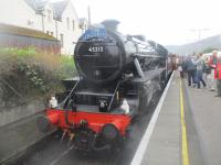 <h4><a href='/locations/F/Fort_William'>Fort William</a></h4><p><small><a href='/companies/W/West_Highland_Railway'>West Highland Railway</a></small></p><p>Stanier Black 5 Class 4-6-0 no. 45212, named after Sir William Stanier (1876-1965), at Fort William station waiting to depart with the 12.50 service of 'The Jacobite' to Mallaig, on Thursday, 8th September 2022. This locomotive, originally no. 5212, was constructed by the firm of Armstrong Whitworth at Newcastle-upon-Tyne in 1935.   The 4 was added by British Railways at Nationalisation in 1948 and the locomotive saw a further 20 years in regular service before being withdrawn in 1968.  Going on the Jacobite had been on my bucket list since seemingly time began! 14/18</p><p>08/09/2022<br><small><a href='/contributors/David_Bosher'>David Bosher</a></small></p>