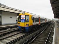 <h4><a href='/locations/C/Clapham_Junction'>Clapham Junction</a></h4><p><small><a href='/companies/L/London_and_Southampton_Railway'>London and Southampton Railway</a></small></p><p>378148, with a London Overground service from Highbury & Islington via Surrey Quays, arriving at Clapham Junction on 23rd May 2015. The headboard reflected the recent introduction of new carriages taking all the 378s from three or four carriages to five per train. 41/58</p><p>29/07/2019<br><small><a href='/contributors/David_Bosher'>David Bosher</a></small></p>