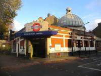 <h4><a href='/locations/K/Kennington'>Kennington</a></h4><p><small><a href='/companies/L/London_and_Southwark_Subway'>London and Southwark Subway</a></small></p><p>The City & South London Railway (originally to have been called the City of London & Southwark Subway) was the world's first underground electric railway opened on 18th December 1890 from King William Street (replaced by Bank in 1900) and Stockwell. Now part of the much-extended Northern Line, but here in south London, Kennington station survives largely unchanged, the only one of the original stations to do so and seen here on the afternoon of Wednesday, 30th November 2022. The dome is not for decorative purposes, though it could be, but houses the mechanism for the lifts from the ticket hall to the deep level platforms.  Kennington became the junction for the Battersea Power Station branch of the Northern Line when this opened on 20th September 2021. 109/138</p><p>30/11/2022<br><small><a href='/contributors/David_Bosher'>David Bosher</a></small></p>