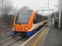 <h4><a href='/locations/G/Gospel_Oak'>Gospel Oak</a></h4><p><small><a href='/companies/H/Hampstead_Junction_Railway_London_and_North_Western_Railway'>Hampstead Junction Railway (London and North Western Railway)</a></small></p><p>710269 London Overground, arriving at the bay platform at Gospel Oak to form the 13.39 return GOBLIN service to Barking Riverside, on a freezing 25th January 2023. On the right, waiting to photograph a freight train that was due to pass at any moment, is my friend and fellow Railscot contributor Bill Roberton, more than 400 miles from his home in Scotland. 16/16</p><p>25/01/2023<br><small><a href='/contributors/David_Bosher'>David Bosher</a></small></p>