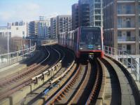 <h4><a href='/locations/W/West_Silvertown'>West Silvertown</a></h4><p><small><a href='/companies/D/Docklands_Light_Railway'>Docklands Light Railway</a></small></p><p>DLR unit no. 03 from Woolwich Arsenal to Bank approaching West Silvertown along the sinuous viaduct from Pontoon Dock, on a bright but bitterly cold 25th February 2023. My favourite pic of the day! 44/46</p><p>25/02/2023<br><small><a href='/contributors/David_Bosher'>David Bosher</a></small></p>