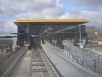 <h4><a href='/locations/L/Luton_DART_Parkway'>Luton DART Parkway</a></h4><p><small><a href='/companies/L/Luton_DART'>Luton DART</a></small></p><p>View from Luton Airport DART Railway train approaching Luton DART Parkway, on the line's first day of service, Friday, 10th March 2023. Just visible at lower left is Luton Airport Parkway station with a class 700 unit on a Thameslink service waiting to depart south towards St. Pancras International. 7/12</p><p>10/03/2023<br><small><a href='/contributors/David_Bosher'>David Bosher</a></small></p>
