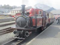 <h4><a href='/locations/P/Porthmadog_Harbour_FR'>Porthmadog Harbour [FR]</a></h4><p><small><a href='/companies/F/Festiniog_Railway'>Festiniog Railway</a></small></p><p>'Fairlie' 0-4-4-0T 'David Lloyd George' waiting to depart from Porthmadog Harbour station with a Ffestiniog Railway service to Blaenau Ffestiniog on 6th April 2019. This was built at the FR's Boston Lodge works in 1992 and is the most powerful steam locomotive in the FR fleet. Following an extensive overhaul, it returned to service in May 2014 fitted with new power bogies and converted to coal firing. 14/14</p><p>06/04/2019<br><small><a href='/contributors/David_Bosher'>David Bosher</a></small></p>