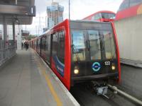 <h4><a href='/locations/C/Canning_Town'>Canning Town</a></h4><p><small><a href='/companies/D/Docklands_Light_Railway'>Docklands Light Railway</a></small></p><p>DLR unit 122 to Woolwich Arsenal, arriving at Canning Town low level, with bus station on right, on Saturday, 25th March 2023. This is also an interchange with the LU Jubilee Line and, combined with the bus station, makes this an important and extremely busy east London interchange. 4/5</p><p>25/03/2023<br><small><a href='/contributors/David_Bosher'>David Bosher</a></small></p>