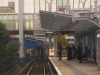 <h4><a href='/locations/P/Poplar'>Poplar</a></h4><p><small><a href='/companies/D/Docklands_Light_Railway'>Docklands Light Railway</a></small></p><p>View from DLR unit 138, from Woolwich Arsenal to Bank, arriving at Poplar where interchange with the Stratford to Canary Wharf line is available, on Saturday, 4th March 2023. This station is more or less on the site of the old London & Blackwall Railway's Millwall Junction that closed in 1926. The original North London Railway Poplar station, that closed in 1944 after war damage, is where the DLR's All Saints station on the Stratford branch now stands. This is actually in the centre of Poplar and should, by rights, have retained that name. Other DLR station names are unfathomable too.   In the background is the inclined viaduct, nicknamed 'the ski slope', that takes the Canary Wharf line over that to Bank and Tower Gateway. 3/5</p><p>04/03/2023<br><small><a href='/contributors/David_Bosher'>David Bosher</a></small></p>