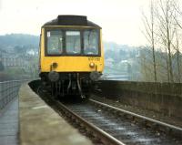 DMU 107 732 on a local service on the approach to Perth over the Tay Viaduct.<br><br>[Ewan Crawford //1988]