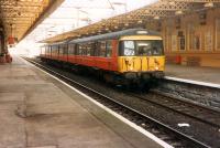 A 303 from Greenock heads for Glasgow.<br><br>[Ewan Crawford //1988]