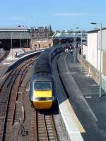 Southbound 125 in Perths Dundee platforms. Note the out of use centre track partly lifted.<br><br>[Ewan Crawford 13/07/2003]