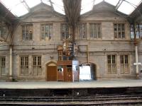 Perth inside the station extension in July 2003. This area was once the station forecourt and the station proper was beyond the building. The platform seen here is now the main Inverness platform.<br><br>[Ewan Crawford 13/07/2003]