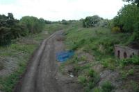 Merryton Junction looking south. Left - old route to Coalburn (overgrown), right - Mid Lanark Lines route now re-instated as far as Larkhall. Old box on right.<br><br>[Ewan Crawford //2004]