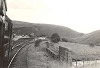 Fairburn tank 42162 approaching Inches station eastbound on 25 July 1953 with a Muirkirk - Lanark train. Just beyond the station the branch to the right crossed a bridge over the Douglas Water to reach Kennox Colliery. [See image 28600]<br><br>[G H Robin collection by courtesy of the Mitchell Library, Glasgow 25/07/1953]