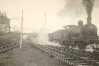 Pick up freight approaching Clarkston 1951. CR 0.6.0 57564.<br><br>[G H Robin collection by courtesy of the Mitchell Library, Glasgow 25/12/1951]