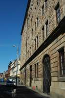 The warehousing of the G&SWRs College Goods Yard looking west. The lines were behind this building to the right. Now flats.<br><br>[Ewan Crawford 05/05/2006]