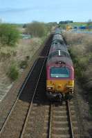 5D03, the empty parcels vans from Aberdeen to Motherwell TMD pass Ashfield.<br><br>[Ewan Crawford 06/05/2006]
