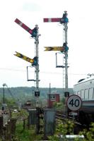 In the distance are Carmuirs West box,  the Falkirk wheel, a train from Glasgow heading north and closer Larbert Jnct box. A train for Edinburgh passes the fine sempahore which will be swept away when the box closes.<br><br>[Ewan Crawford 06/05/2006]