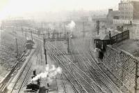 View from top of tunnel. [Railscot note: extensive goods yard to left and centre, approach lines to station right-centre and former engine shed right. Site infilled and built on.]<br><br>[G H Robin collection by courtesy of the Mitchell Library, Glasgow 21/04/1954]