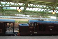 I know where I would want to sit with my evening cocoa heading into a sunset. The Royal Scotsman overnighting at Wemyss Bay. The locomotives were 37 214 and 47 854.<br><br>[Ewan Crawford 08/05/2006]