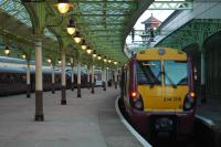 Special train and local train. The Royal Scotsman overnighting at Wemyss Bay. The locomotives were 37 214 and 47 854.<br><br>[Ewan Crawford 08/05/2006]