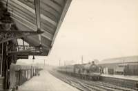 CR 4-4-0 54449 arriving from Edinburgh. (Raining)<br><br>[G H Robin collection by courtesy of the Mitchell Library, Glasgow 22/07/1950]