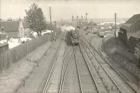 Helmsdale - Inverness train approaching Rose Street Junction past the harbour branch. 5P 4.6.0 45192. <br><br>[G H Robin collection by courtesy of the Mitchell Library, Glasgow 04/07/1950]