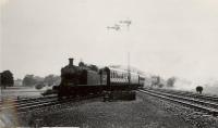 Forfar - Arbroath train passing Guthrie Junction. NBR 4.4.2T 67493.<br><br>[G H Robin collection by courtesy of the Mitchell Library, Glasgow 15/08/1953]