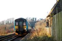 A friendly wave from the driver of a southbound (for York) Sprinter passing the closed Culgaith station.<br><br>[Ewan Crawford 02/12/2004]