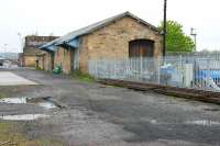 Railway remains at Hexham in May 2006, looking west towards the station which is obscured by the water tank. The well known signal box is behind the camera.<br><br>[John Furnevel 10/05/2006]