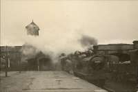 Tebay train arriving at Kirkby Stephen (East end). NER 0.6.0 65090.<br><br>[G H Robin collection by courtesy of the Mitchell Library, Glasgow 13/04/1951]