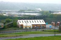 Photograph taken from the high ground on the north bank of the Tyne at Scotswood on a Sunday morning in May 2006. View is south over Scotswood Road towards the old rail bridge. Across the river is part of the Blaydon industrial area with the streets of Whickham and the western edge of Gateshead beyond. [See image 38015]<br><br>[John Furnevel 07/05/2006]