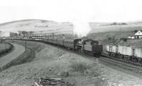 BR standard Class 3 2-6-0 77017 near the Cutler bridge, Waterside, with an Ayr to Dalmellington train on 28 March 1959.<br><br>[G H Robin collection by courtesy of the Mitchell Library, Glasgow 28/03/1959]