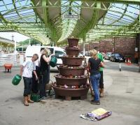 Thirsty work. Friends of Wemyss Bay in action on 30 June 2010. First ScotRail's 'Adopt a Station' policy was recently recognised by way of a NR Community Engagement Award - see news item. <br>
<br><br>[Friends of Wemyss Bay 30/06/2010]