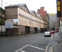 100 years on. The former NER parcels depot of 1906 stands in Westgate Road alongside the east end of Newcastle Central in 2006, with all windows now boarded up. When operational the building was accessible at both road and platform levels [see image 21815]. <br><br>[John Furnevel 07/05/2006]