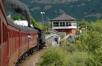 Approaching Banavie swing bridge at low speed. There is a severe speed restriction on the bridge over the Caledonian Canal. The RETB system is based in the signalbox-style building.<br><br>[Ewan Crawford 28/05/2006]